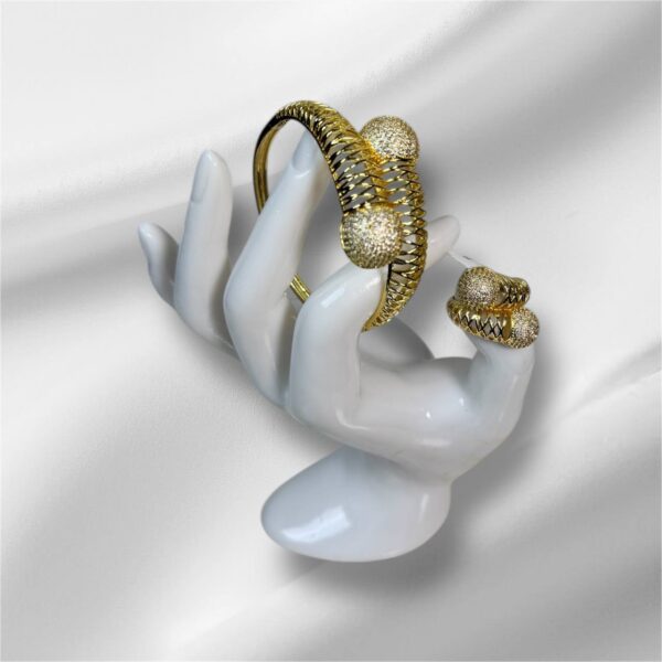 #131 18K ITALIAN GOLD BANGLES WITH RINGS