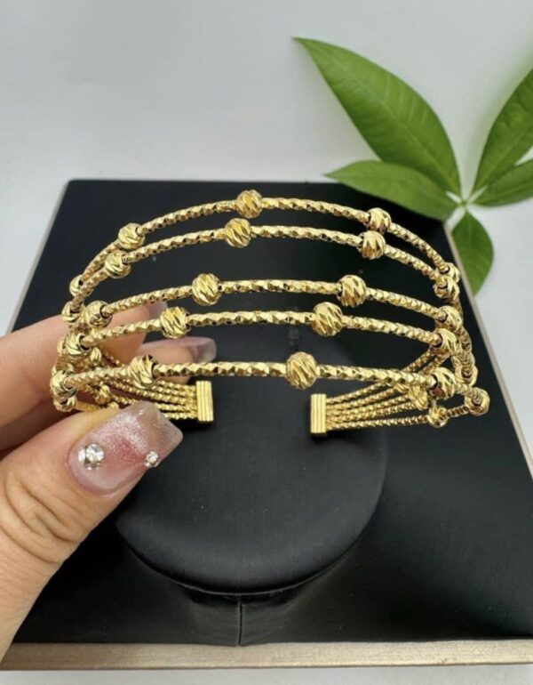 #138 18K ITALIAN GOLD BANGLES WITH RINGS